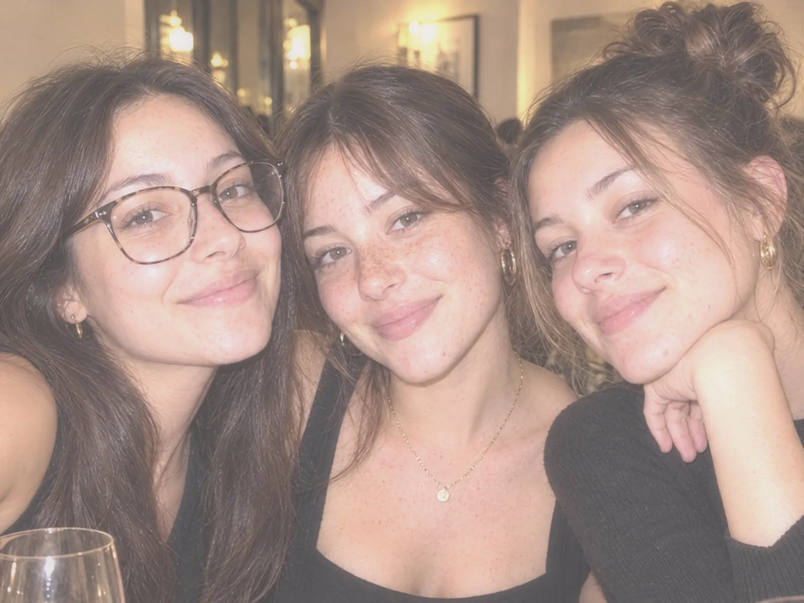 Three friends in a restaurant, As taken
